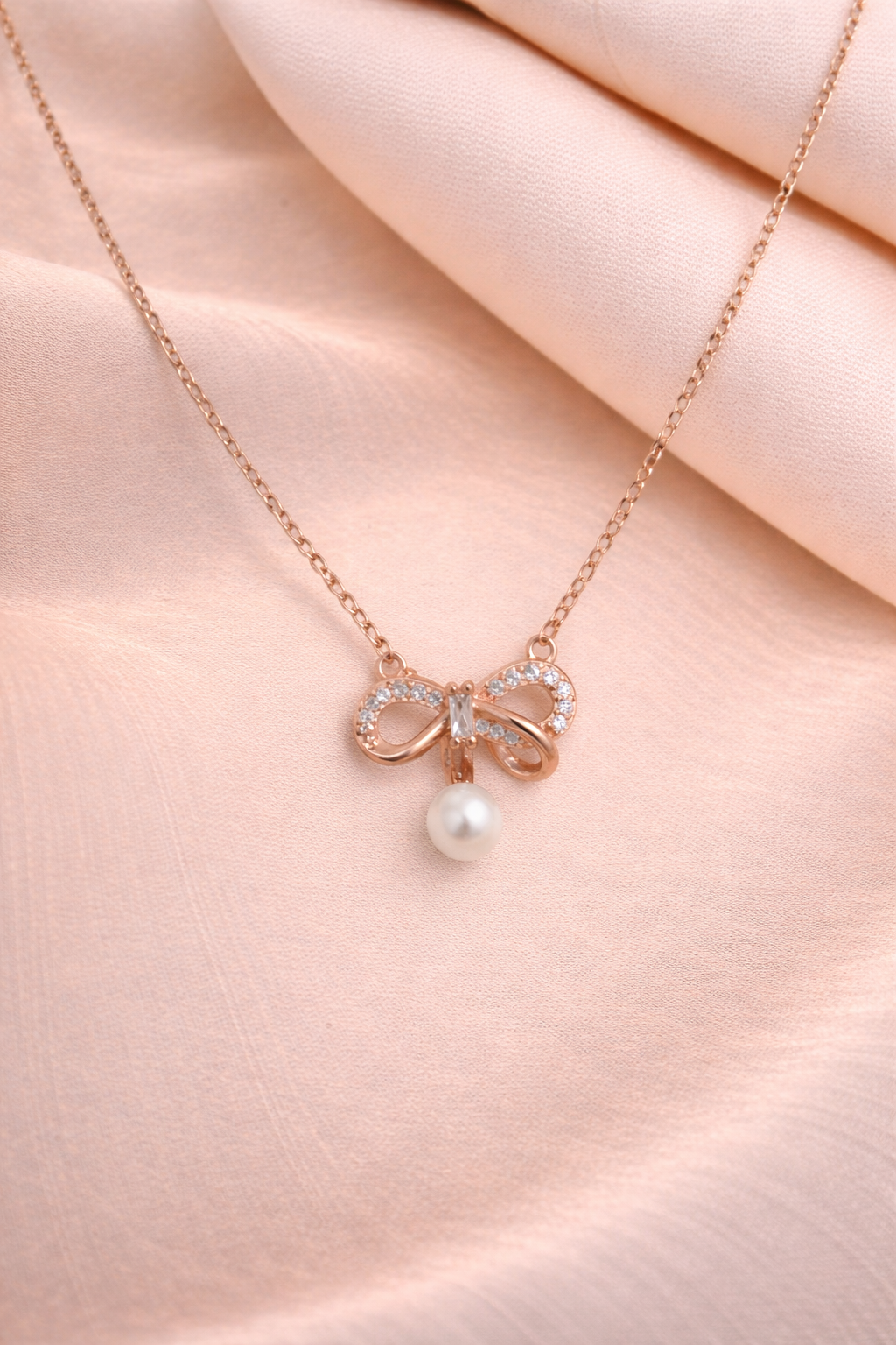 Pearl Bow Charm Pendant