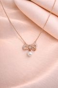 Pearl Bow Charm Pendant
