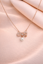 Pearl Bow Charm Pendant